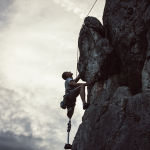 man with prosthetic leg climbing 