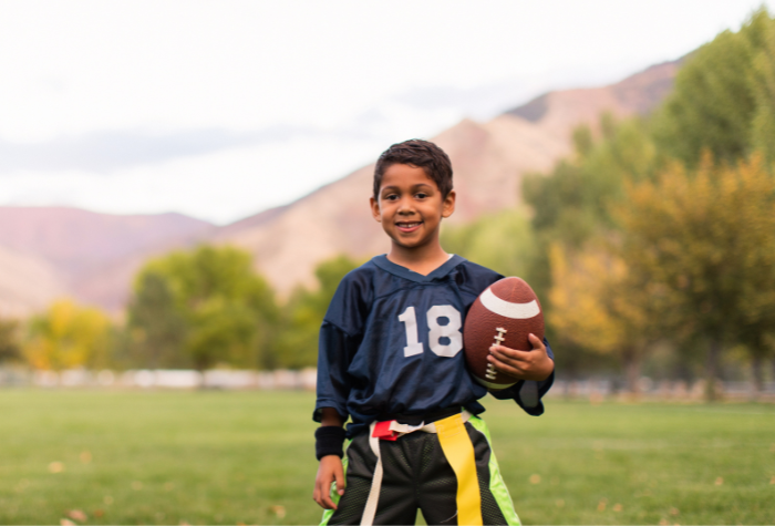 Boy with a rugby ball